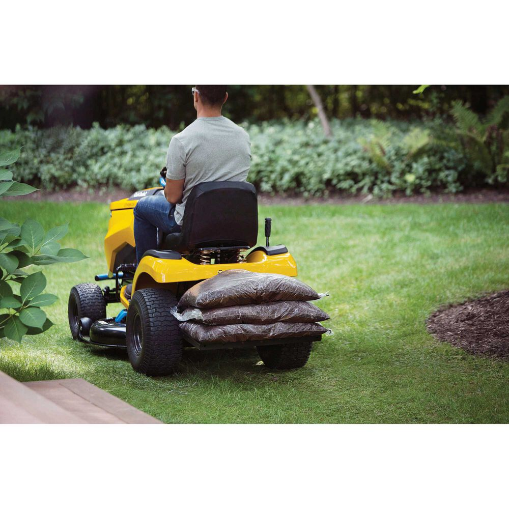 Casavibeo Cub Cadet XT1 LT42E electric lawn tractor with 42-inch cutting deck and ergonomic seat, ready for yard maintenance.