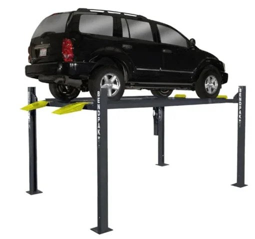 Casavibeo BENDPAK HD-7P 7,000-lb. extra-tall car lift with sturdy metal arms and support beams in a workshop setting.
