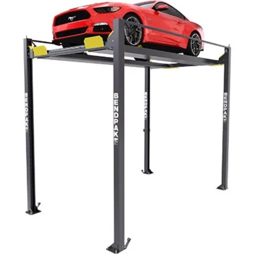 Casavibeo BENDPAK HD-7PXW 7,000-lb heavy-duty car lift with sturdy metal arms and safety features, shown in a workshop setting.