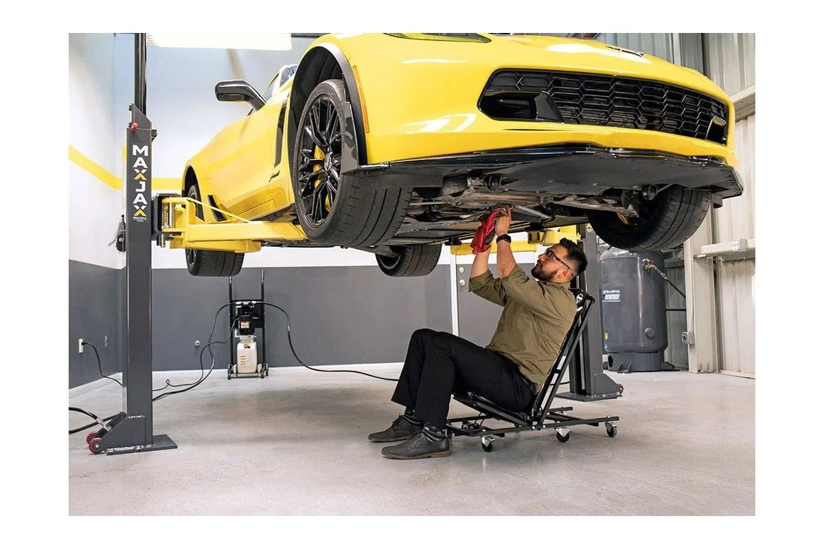 Casavibeo MaxJax portable two-post garage lift with sturdy metal arms and hydraulic system for vehicle lifting.