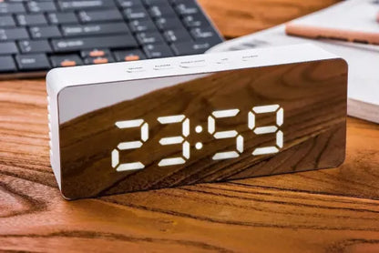 Digital alarm clock with smart mirror display, bedside nightlight and modern design by Belro for home decor and timekeeping.