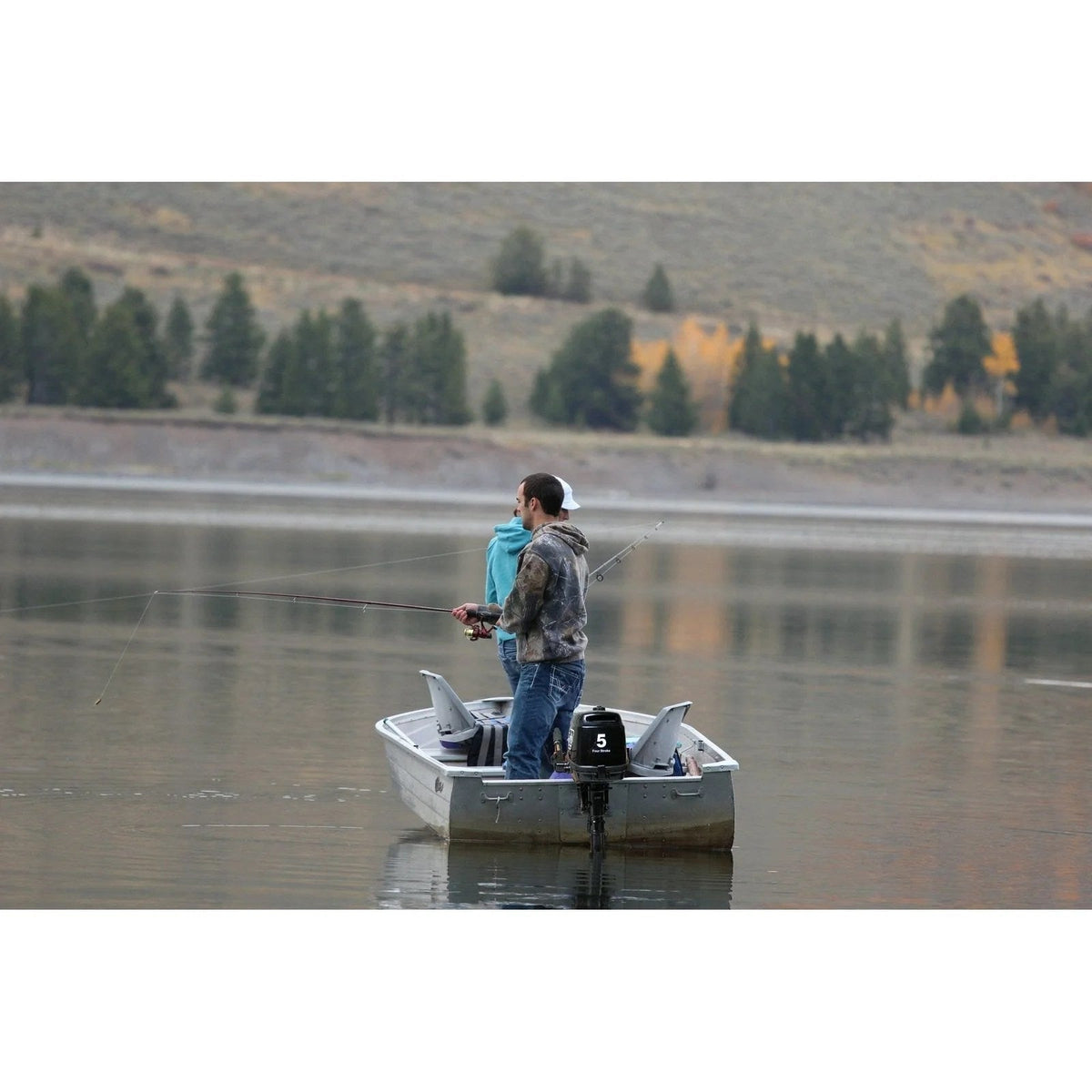 Casavibeo Coleman Powersports 5 HP 4-stroke outboard boat motor with easy pull start, shown in outdoor water setting