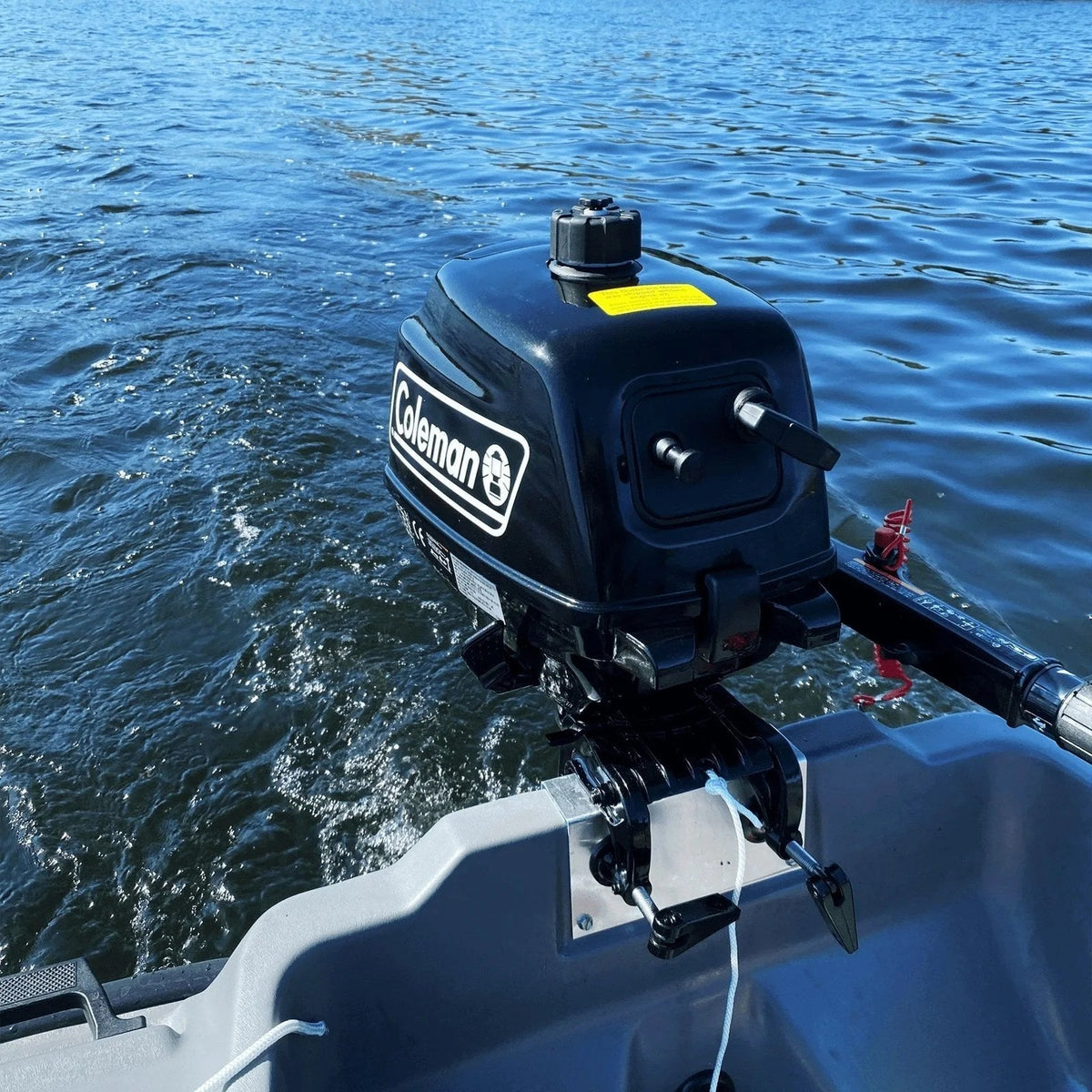 Casavibeo Coleman Powersports 5 HP 4-stroke outboard boat motor with easy pull start, compact and durable for boating adventures.