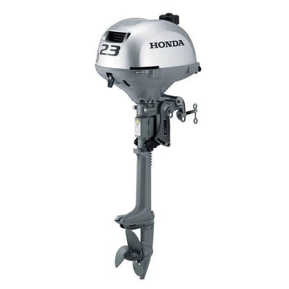 Casavibeo Honda BF2.3 outboard motor showing compact engine with black and silver components, mounted on a boat.