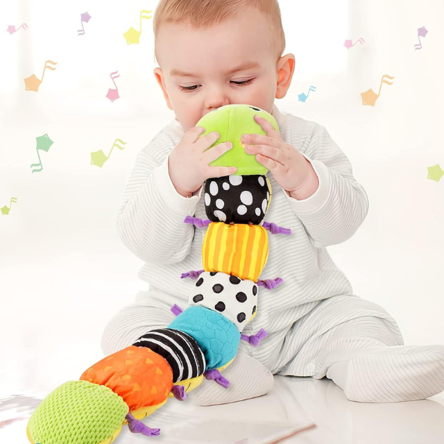 Soft plush sensory caterpillar baby rattle by Belro, featuring colorful plush fabric and gentle rattling sounds for infants.