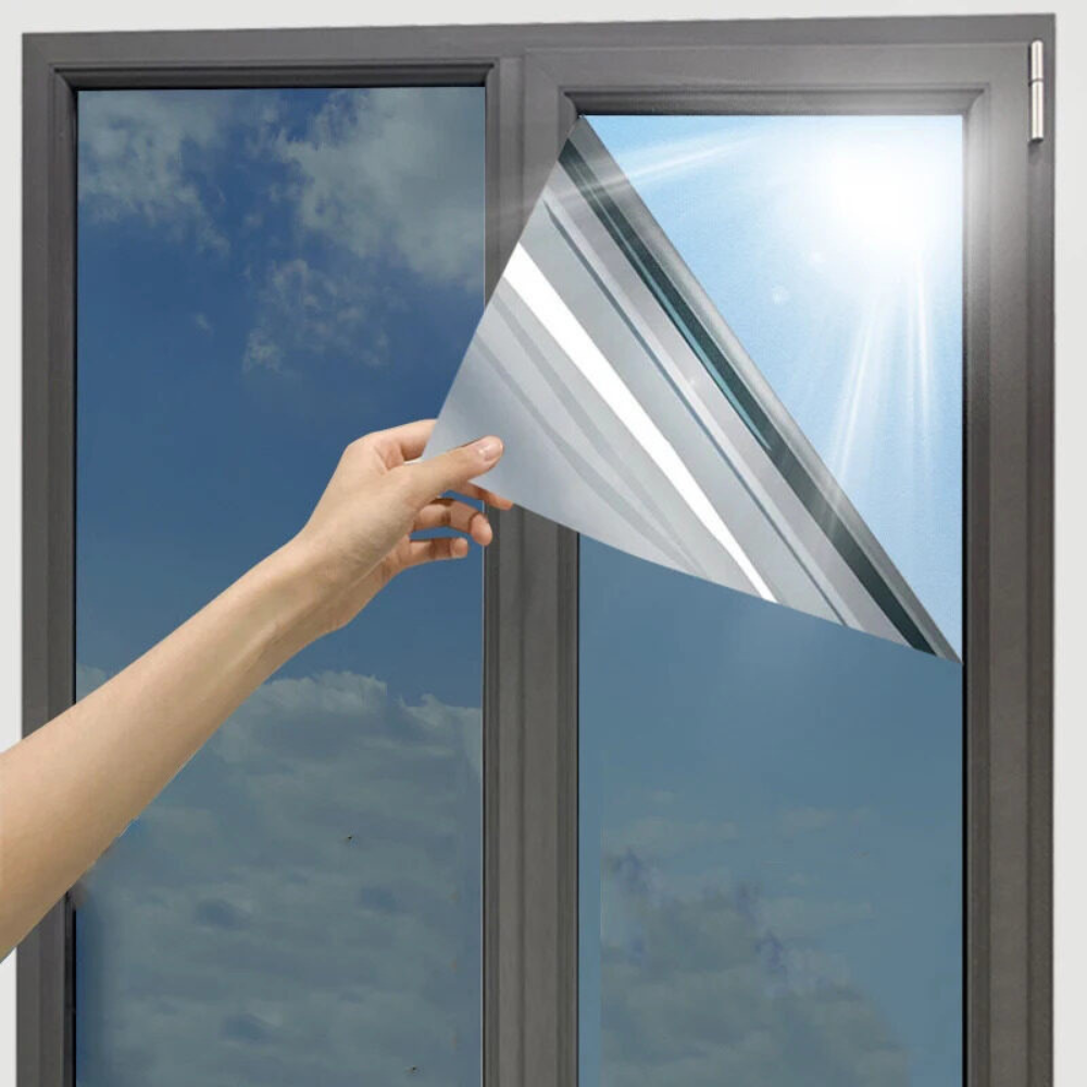 Belro reflective one-way privacy window insulation film on a glass window, enhancing privacy while reducing heat transfer.