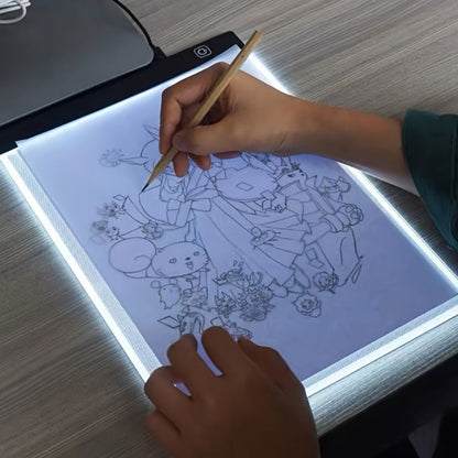 Belro A4 A5 ultra-thin LED drawing tablet for tracing and sketching, shown on a clean surface with stylus pen included.