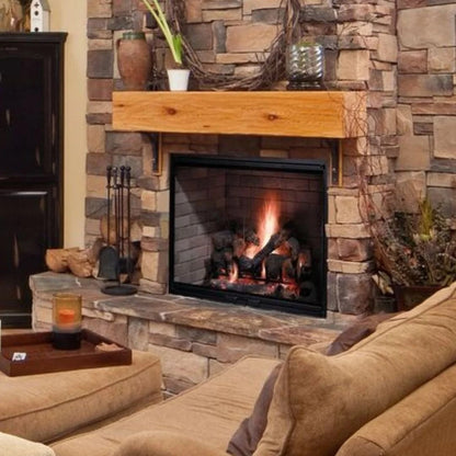 Casavibeo Majestic Biltmore 36-inch radiant wood burning fireplace with a stone surround and glowing fire inside.