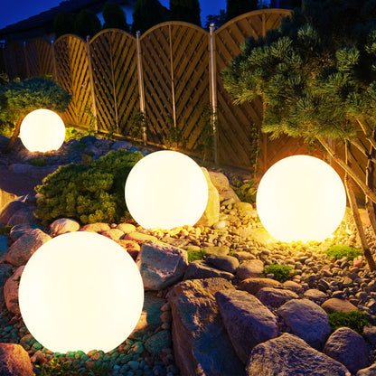 BowLift Garden Globe Light, weatherproof solar LED outdoor garden light with glowing globe design in a lush garden setting.