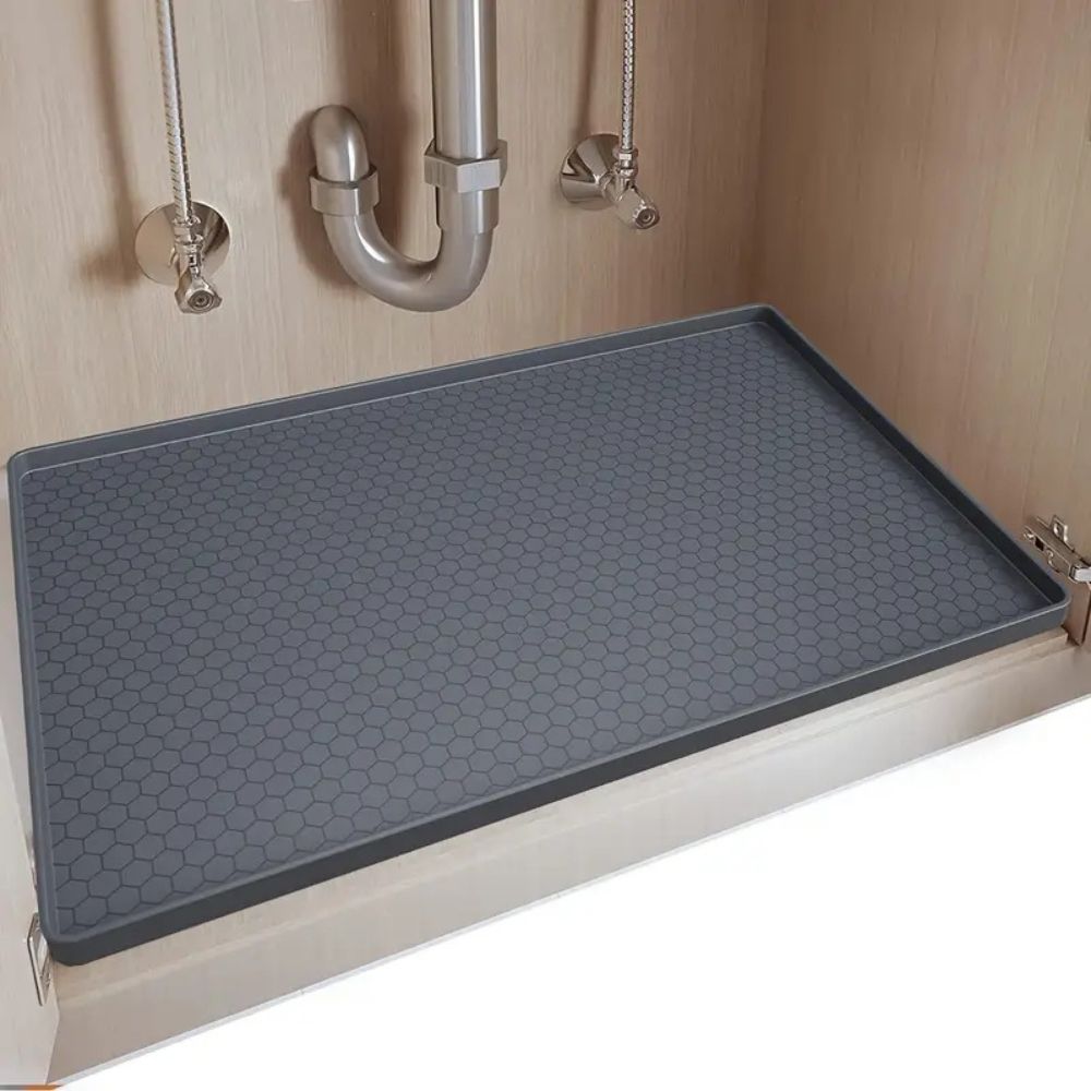 Belro large silicone under kitchen sink mat with protective liner, designed to catch spills and organize under the sink area.