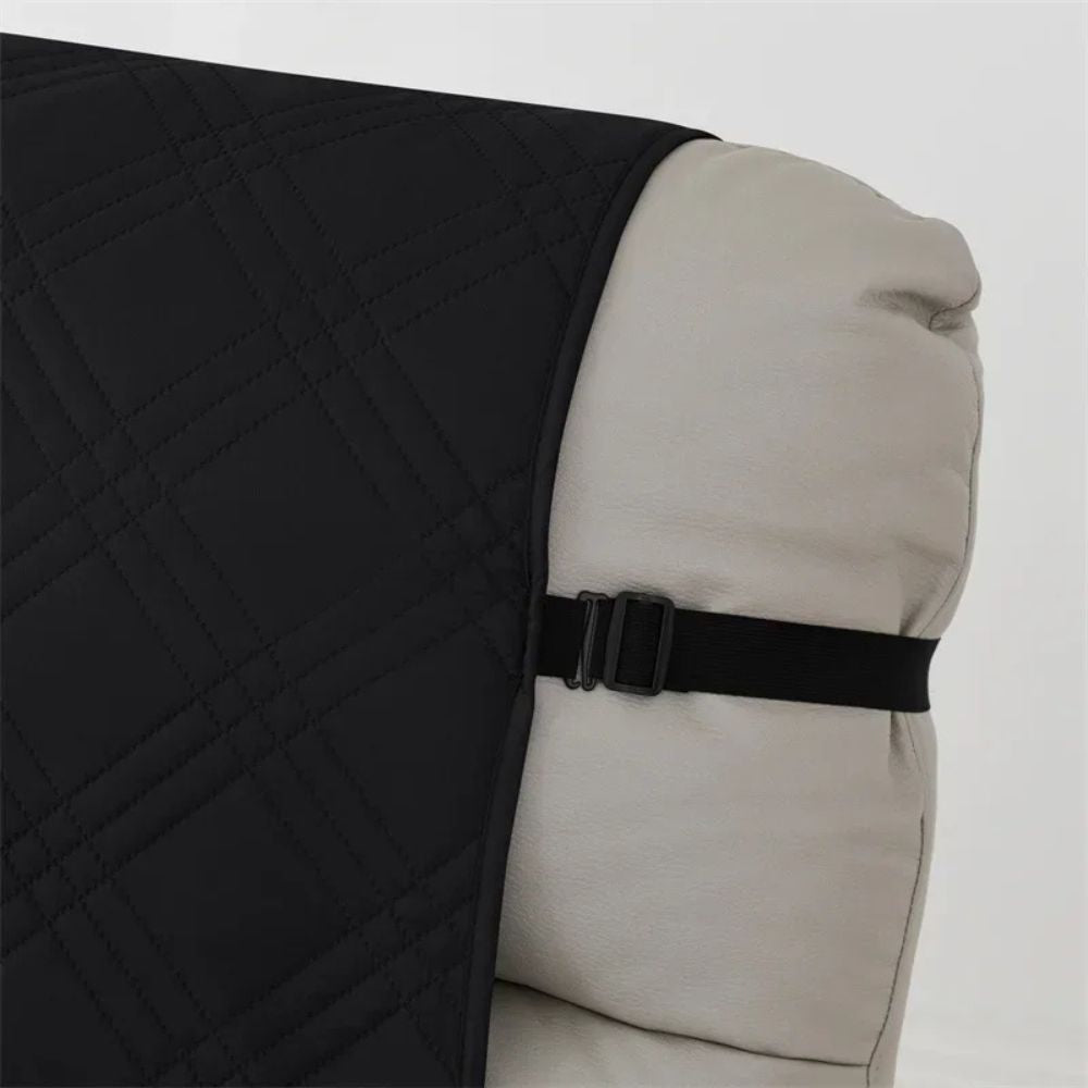 Belro waterproof quilted recliner arm chair slip cover on a sofa, showing durable fabric and fitted design for protection.