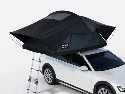 Casavibeo TentBox Lite XL roof top tent mounted on a vehicle, showing its compact design and extended sleeping area.
