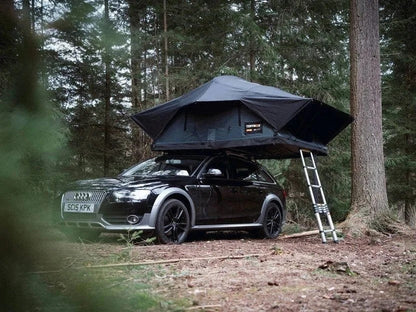 Casavibeo TentBox Lite XL roof top tent mounted on car with open windows and canvas fabric, ready for camping outdoor adventure.