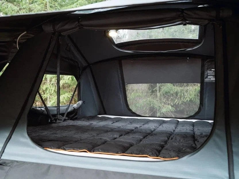 Casavibeo TentBox Lite XL roof top tent set up on a vehicle, showcasing its spacious design and durable fabric for outdoor camping.