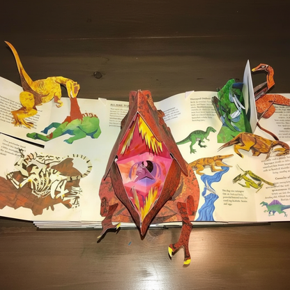Colorful 3D pop-up dinosaur book by BowLift featuring interactive prehistoric scenes for kids and adults.
