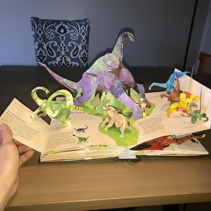Colorful 3D Pop-Up Dinosaur Book by BowLift showcasing interactive prehistoric scenes for kids and adults.