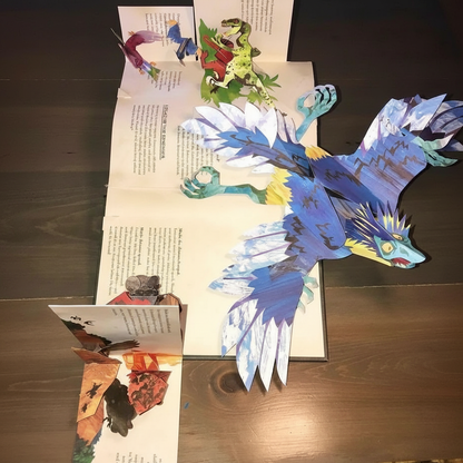 Colorful 3D pop-up dinosaur book by BowLift featuring interactive prehistoric scenes for kids and adults.