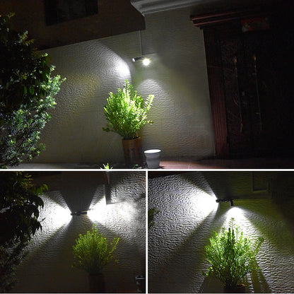 Belro Super Bright Outdoors Motion Sensor Solar LED Lights mounted on a garden wall, illuminating the outdoor space at night
