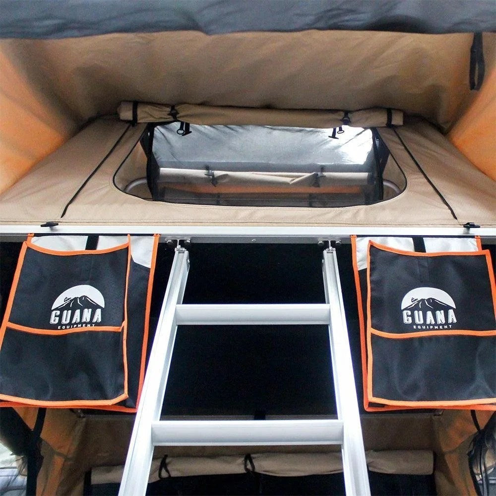 Casavibeo Guana Equipment Wanaka roof top tent mounted on vehicle, showcasing durable fabric and spacious interior for camping adventures.