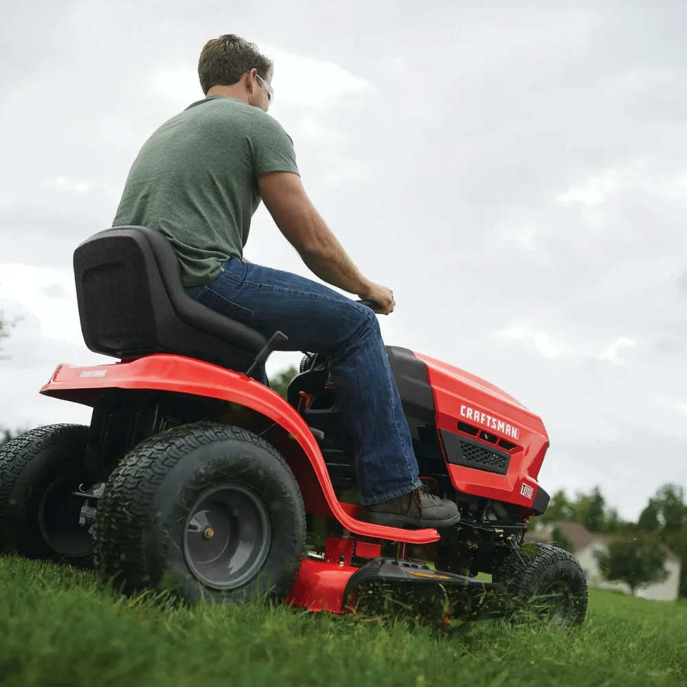 Craftsman T110 42-inch riding mower with 17.5 HP Briggs & Stratton engine and 7-speed transmission, shown on a lawn.