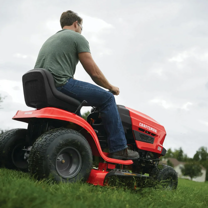 Craftsman T110 42-inch riding mower with 17.5 HP Briggs & Stratton engine and 7-speed transmission, shown on a lawn.