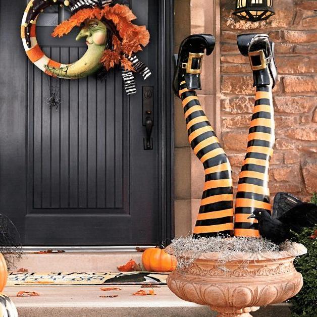 Belro witch leg stakes Halloween yard decorations, set of two, featuring spooky faux clothing for outdoor spooky display.
