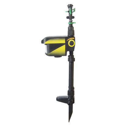 Belro solar-powered motion-activated deer sprinkler in a garden, designed to scare away deer with water spray.