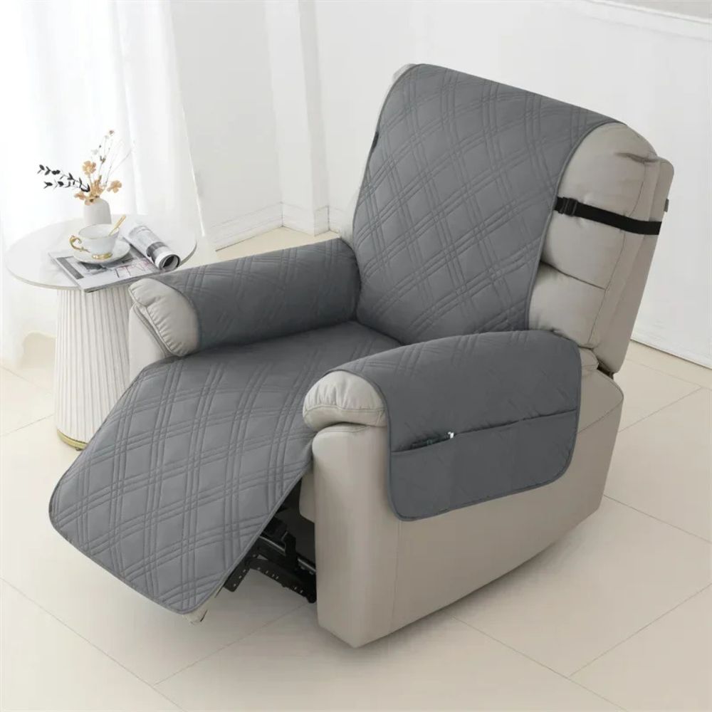 Belro waterproof quilted recliner arm chair slip cover on a sofa, showing its fit and textured quilted fabric protection.