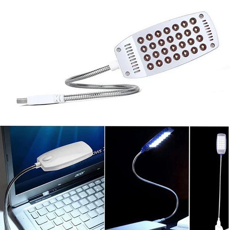 Belro Portability Laptop Light attached to a laptop, white compact LED light for office and stationery use.