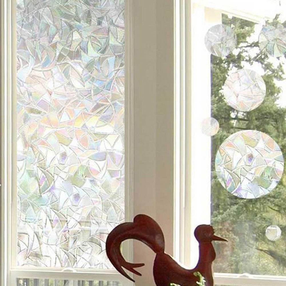 Decorative rainbow stained glass effect privacy film for windows, featuring vibrant colors and intricate design by Belro.