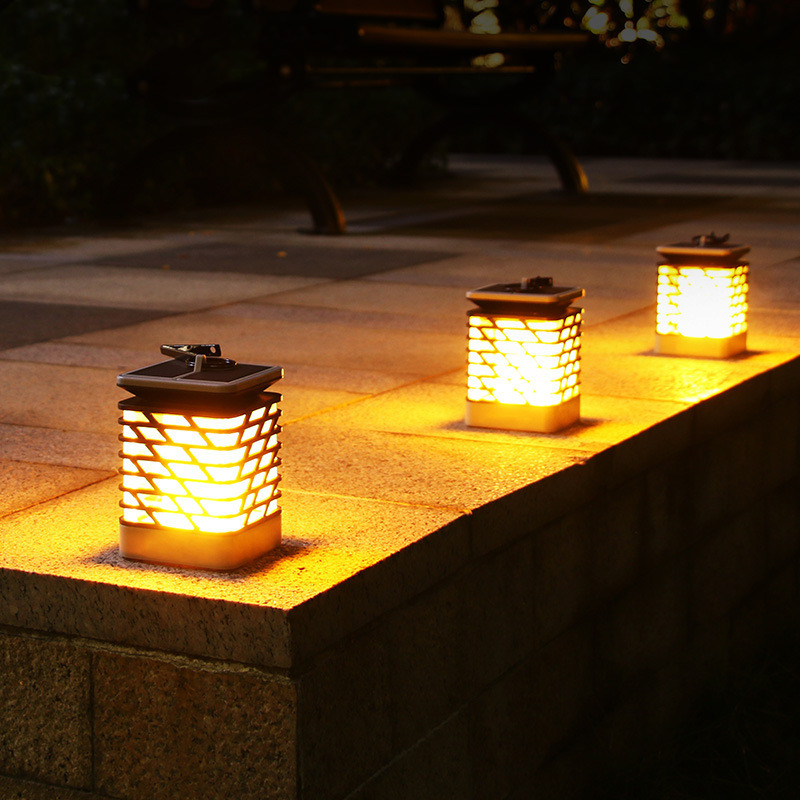 Belro Solar LED Garden Lantern lighting a garden path with a warm glow, ideal for outdoor home and garden décor.