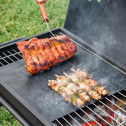 Belro Chef non-stick BBQ grill mat laid out on a grill, designed for easy grilling and preventing food sticking.