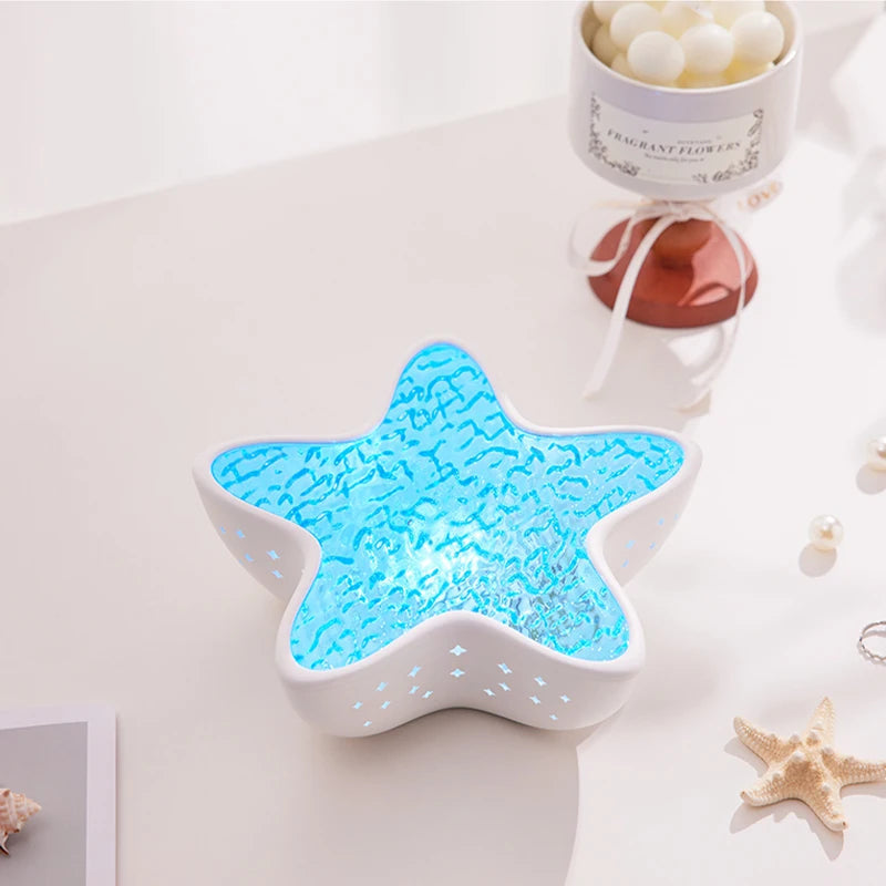 Belro starfish ocean wave night light projector illuminating a room with calming ocean scenes and starfish projections.