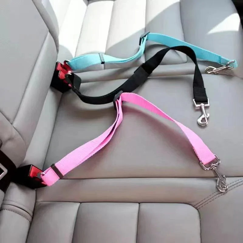 Adjustable Belro dog seat belt attached to car seat, nylon strap with clip for securing pets during travel.