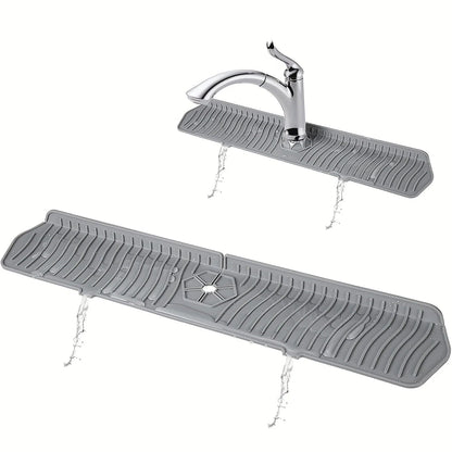 Belro silicone kitchen sink splash guard in use, preventing water splashes and keeping the sink area dry.
