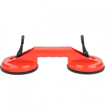 Belro dual suction glass window dent pulling suction cup attached to a window for easy dent removal.