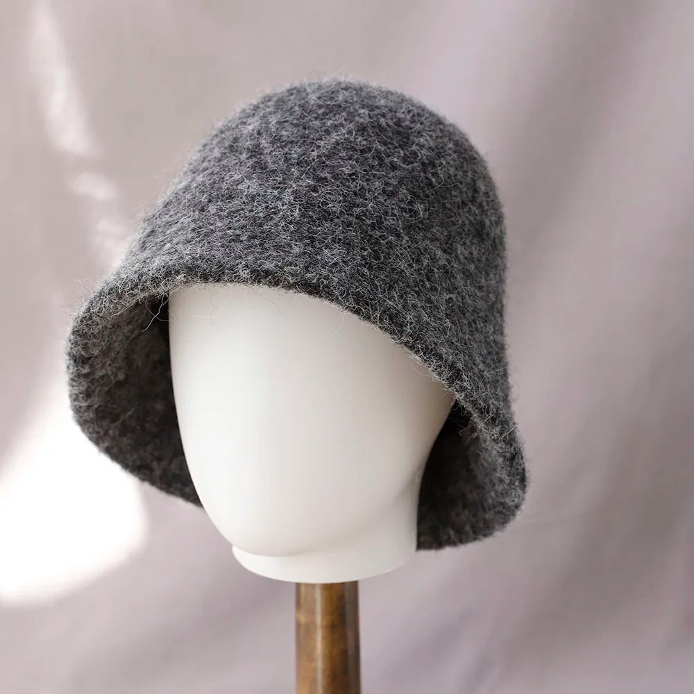 Belro women's winter wool bucket hat, cozy accessory with a classic design, perfect for cold weather and winter style.