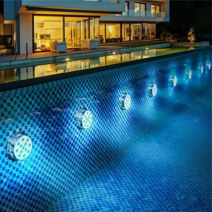 Belro submersible LED lights for outdoor use, shown submerged in water with vibrant illumination, ideal for garden and pond lighting.