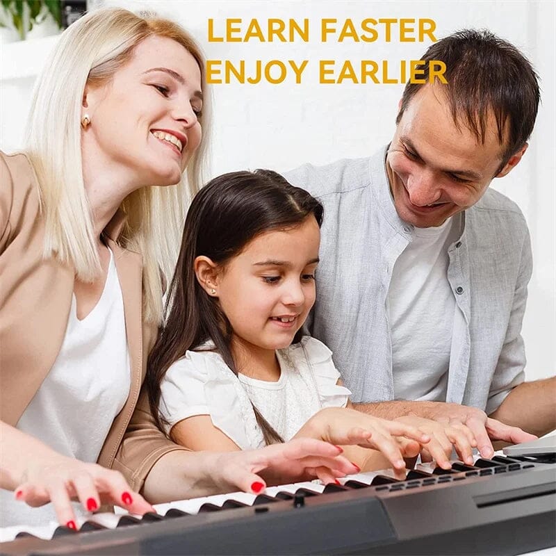 Color-coded BowLift removable piano keyboard note labels on a piano keys, aiding music learning and note recognition.