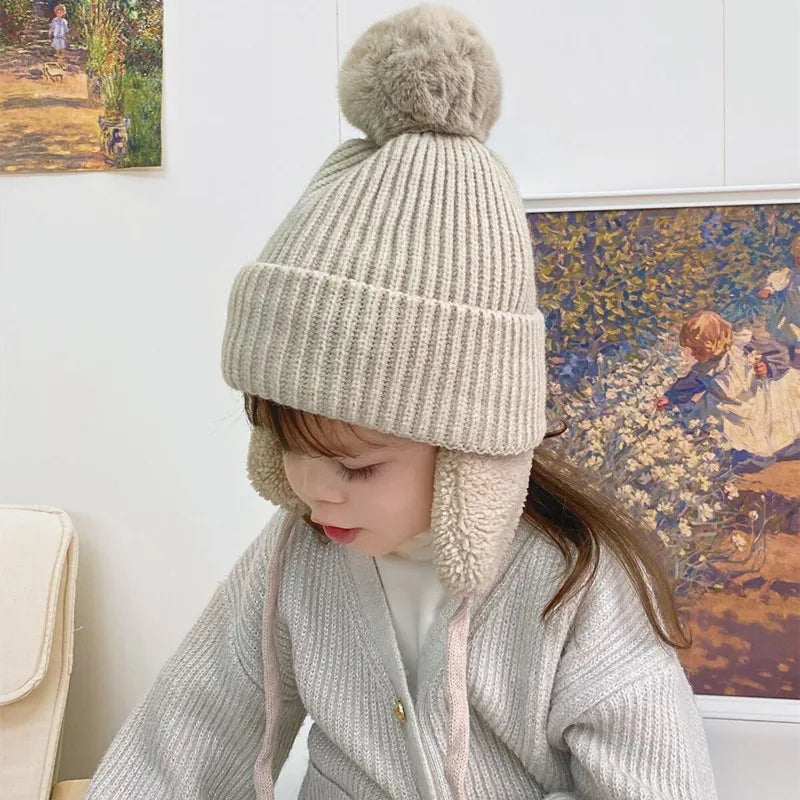 Belro kids knit beanie winter hat with earflaps, cozy and warm, featuring colorful patterns for children.