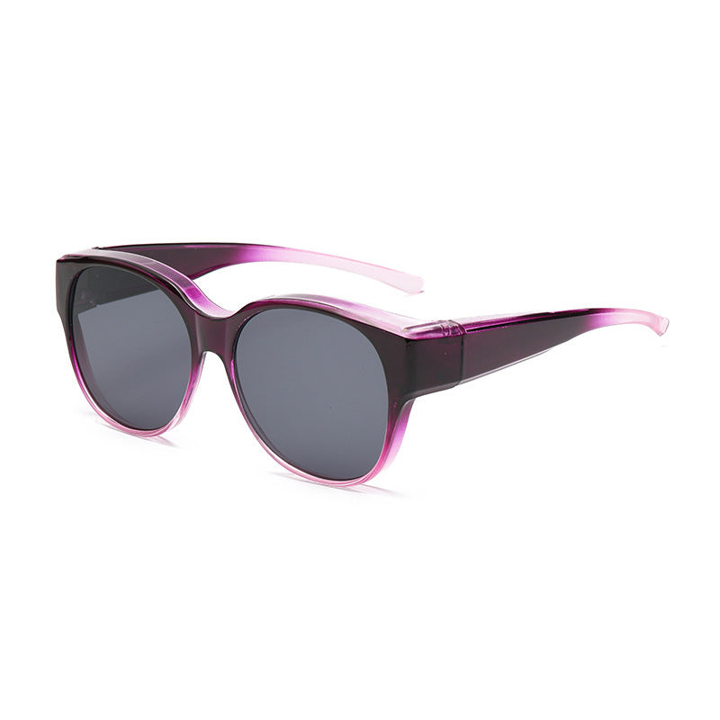 BowLift Fit-Over Polarized UV400 sunglasses with wraparound design, designed to be worn over glasses, in a sleek black frame.