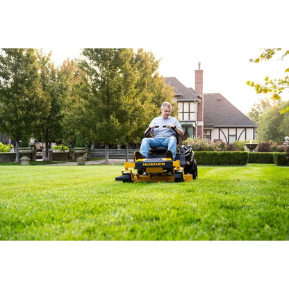 Casavibeo Hustler Raptor X zero-turn mower with 42-inch deck and Kawasaki FR600 18hp engine, showcasing the mower's cutting deck and engine.
