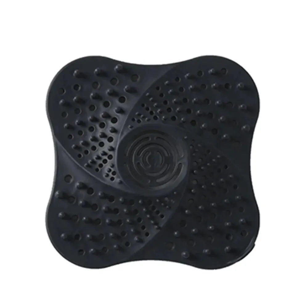 Black Belro anti-blocking spiral shower drain hair catcher with a flexible design for preventing clogs and easy cleaning.