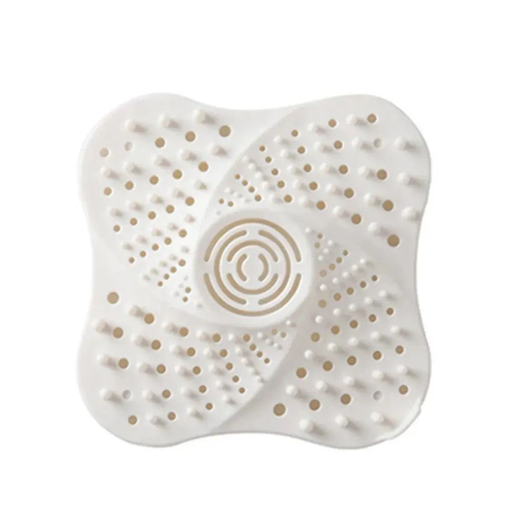 White Belro anti-blocking spiral shower drain hair catcher with easy installation and durable design for kitchen or bathroom use.
