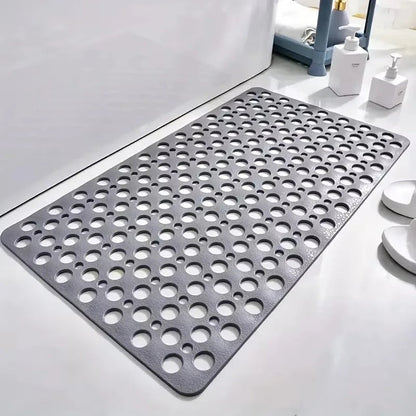 Grey Belro non-slip bath mat for shower, textured surface, designed for safety and comfort in home bathroom flooring.