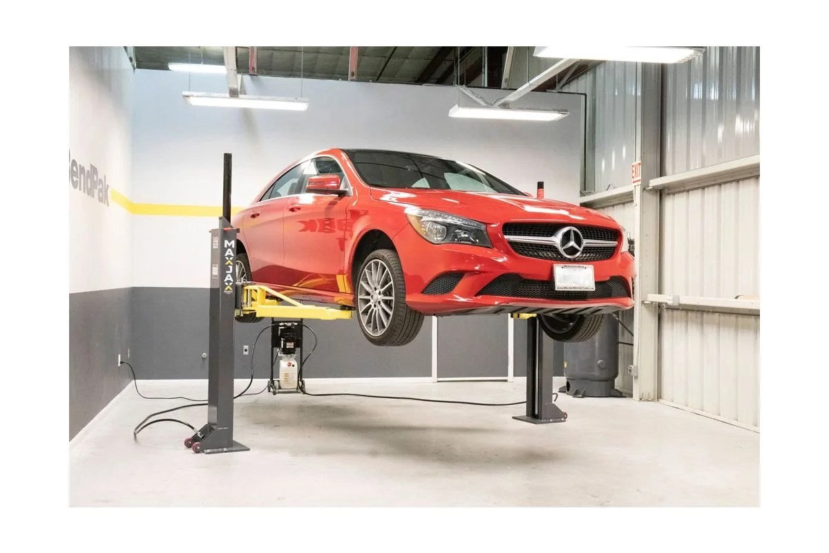 Casavibeo MaxJax portable two-post garage lift with steel arms and hydraulic system for vehicle maintenance and lifting.
