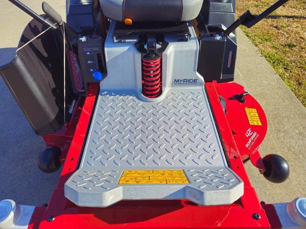Toro 42-inch TimeCutter MyRide zero-turn mower with 22HP Kohler engine, featuring a wide cutting deck and comfortable ride.