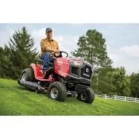 Casavibeo Troy-Bilt Bronco 42-inch riding lawn mower with cutting deck and ergonomic seat, ready for outdoor grass trimming.