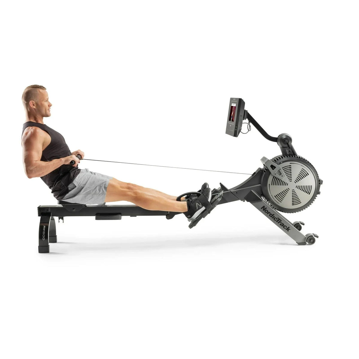 NordicTrack RW600 rowing machine with adjustable resistance and digital display, shown in a modern home gym setting.