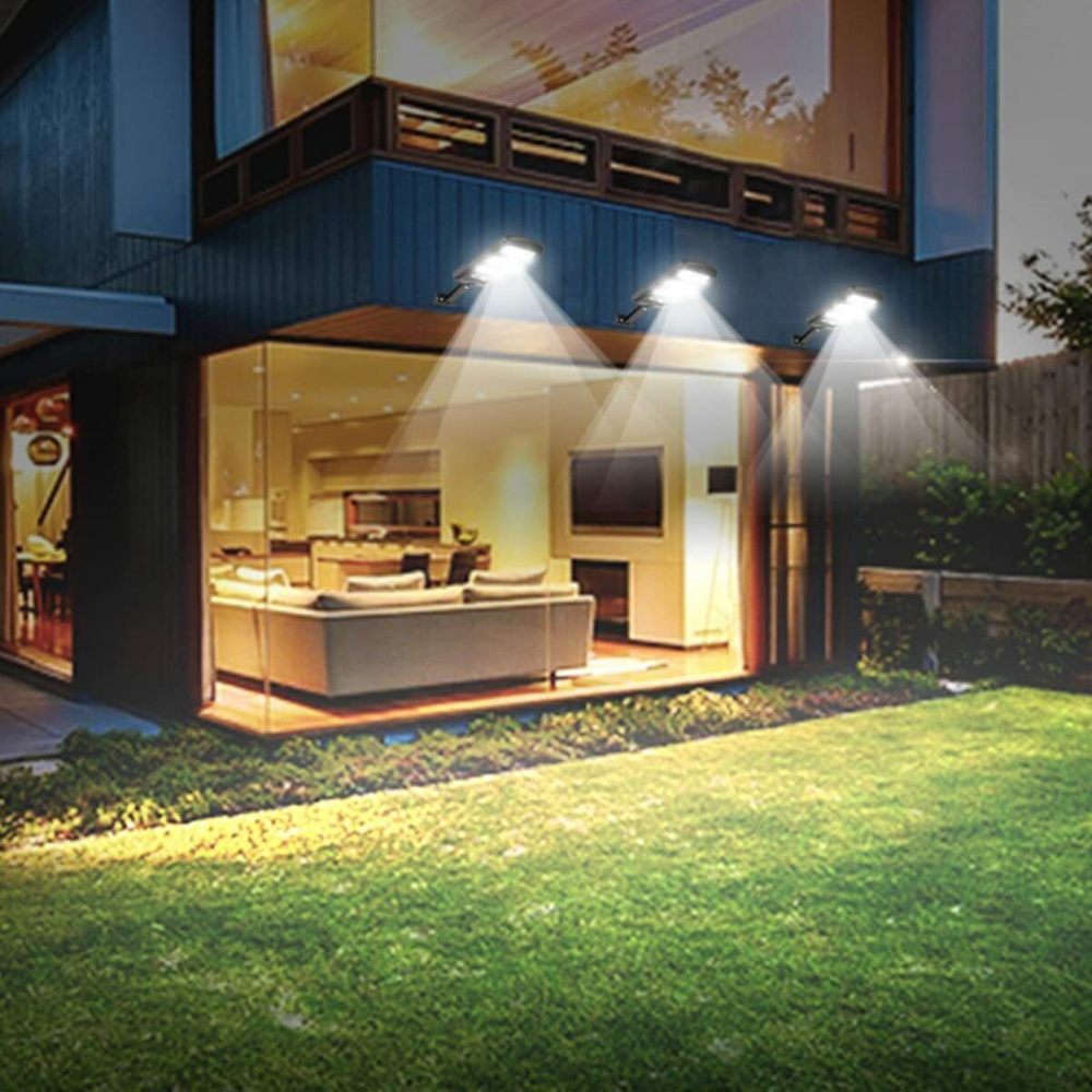 Belro waterproof outdoor solar driveway street light illuminating a garden pathway at dusk.